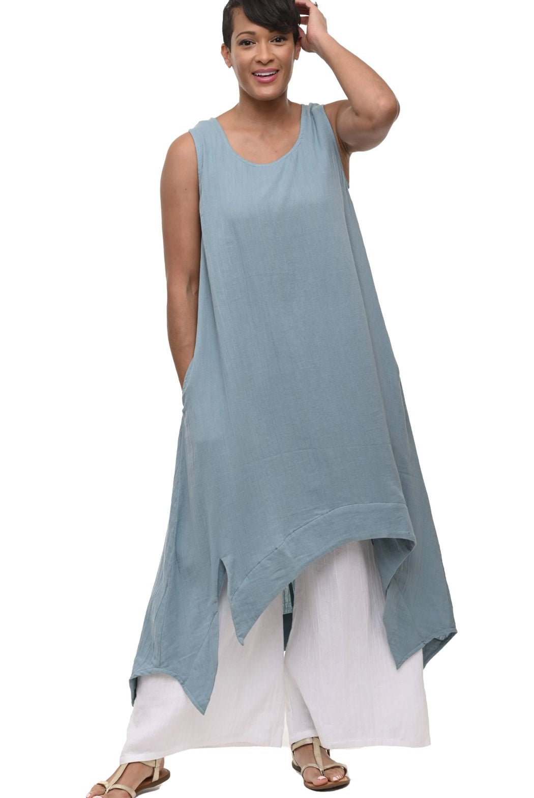 woman wearing blue sleeveless dress