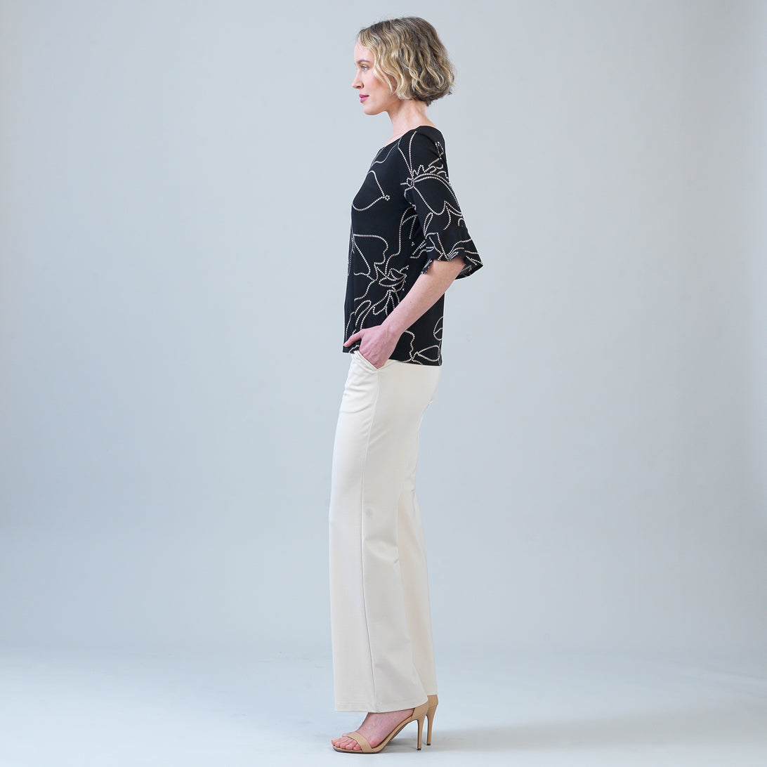 Side view of the Clara Sunwoo floral foiled knit top