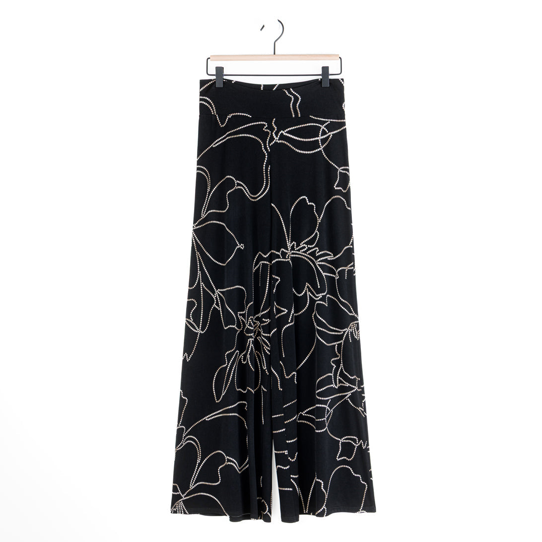 Clara Sunwoo black and taupe floral foiled palazzo pant laid flat