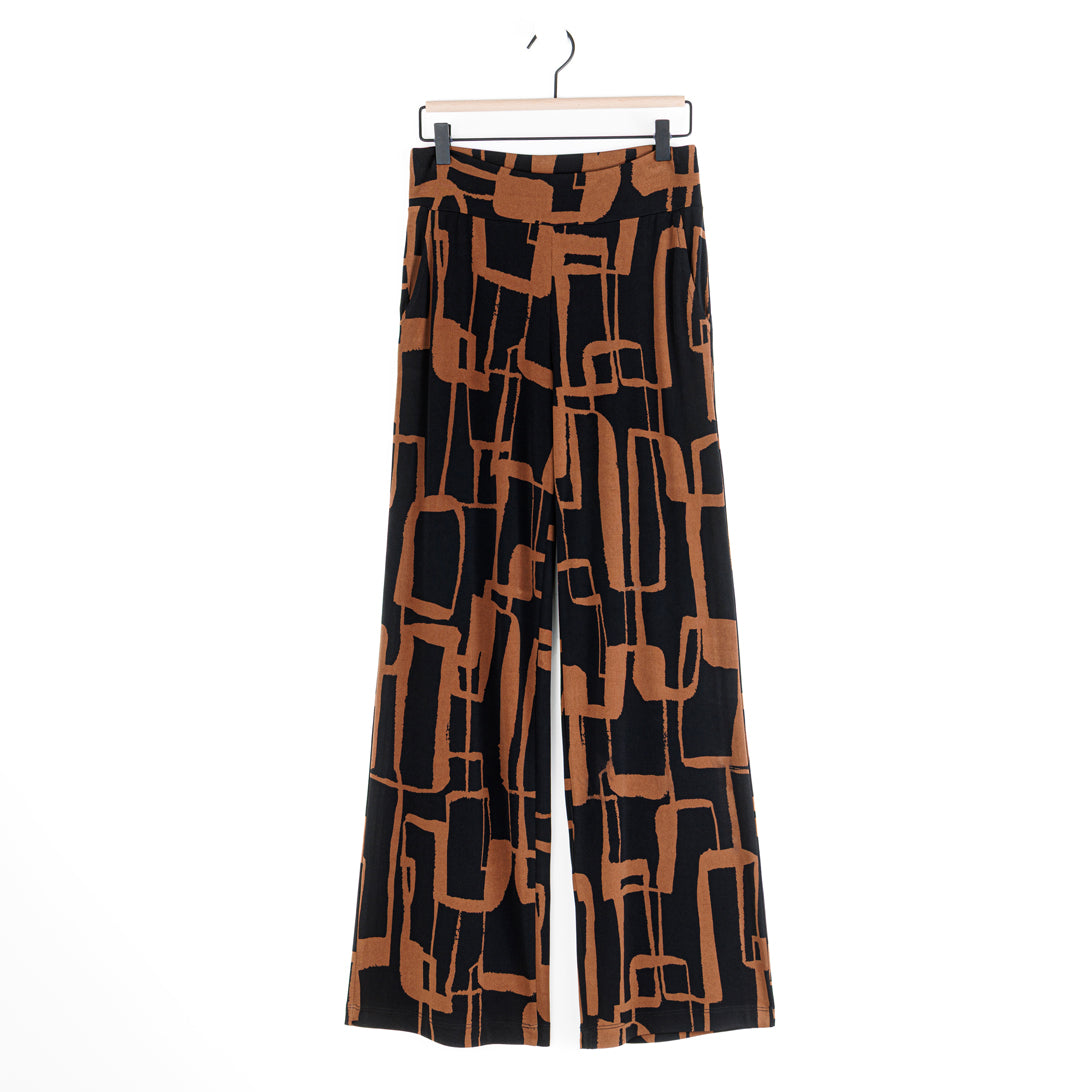 Clara Sunwoo black and brown geo chain print pant laid flat