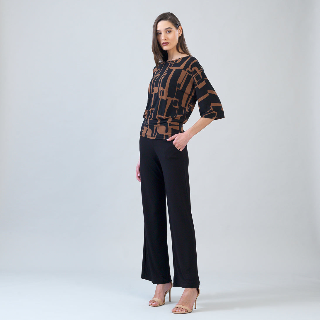 Side view of the Clara Sunwoo black and brown geo print top
