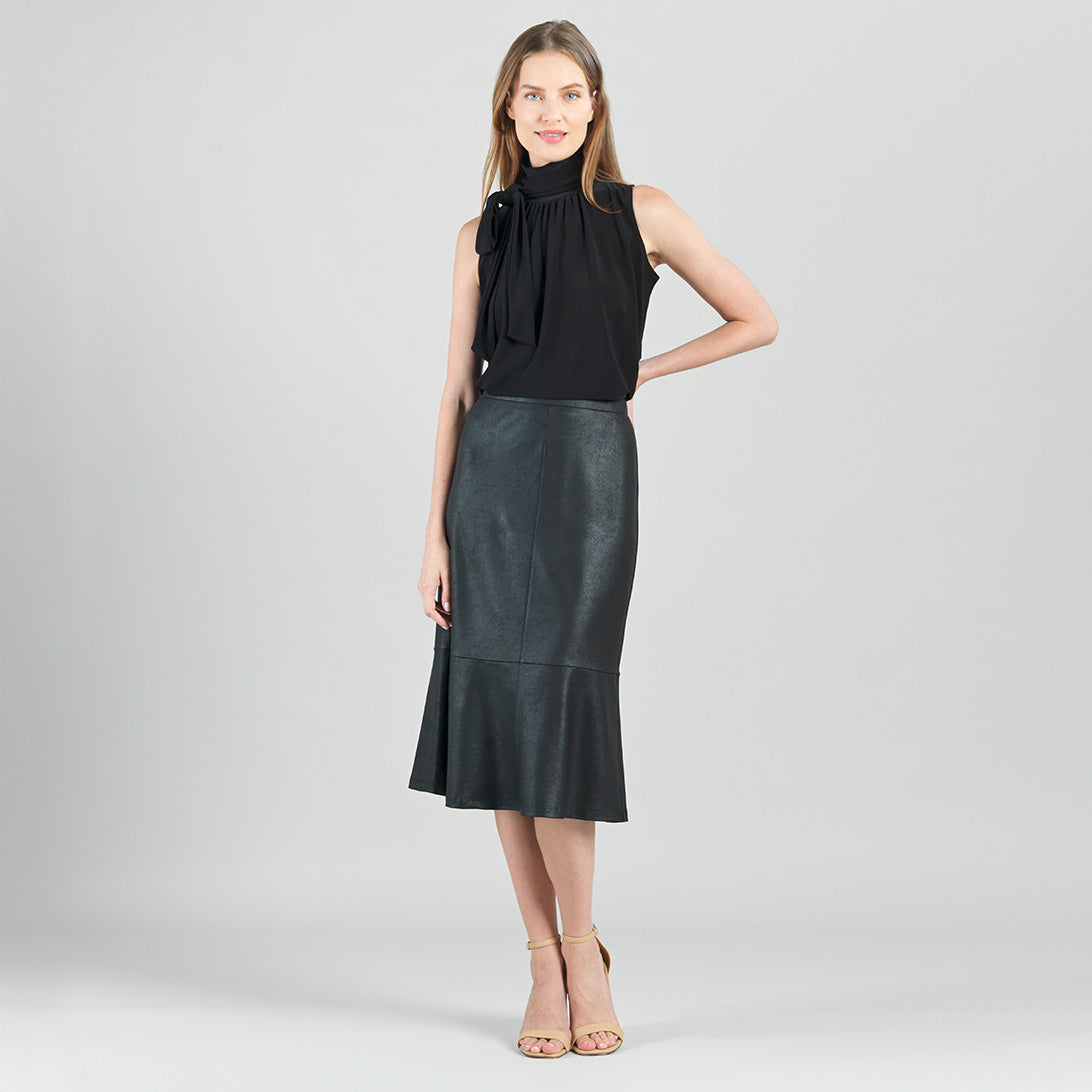 Clara Sunwoo black faux leather flounce skirt styled with a tucked top