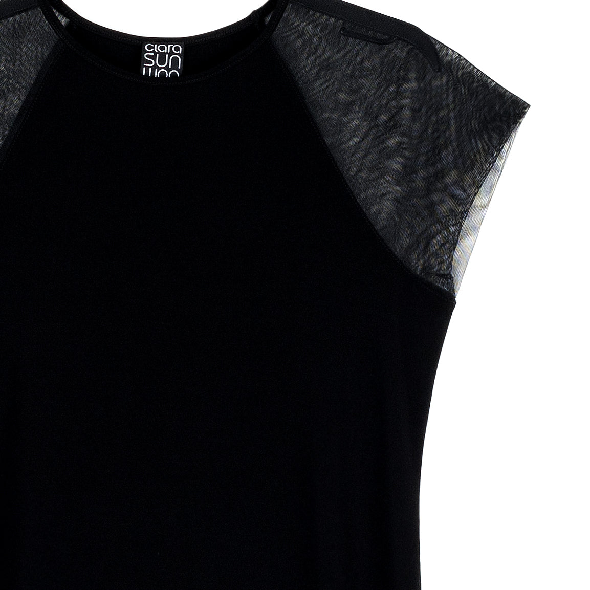 Close-up of the sheer mesh cap sleeve on the black Clara Sunwoo dress