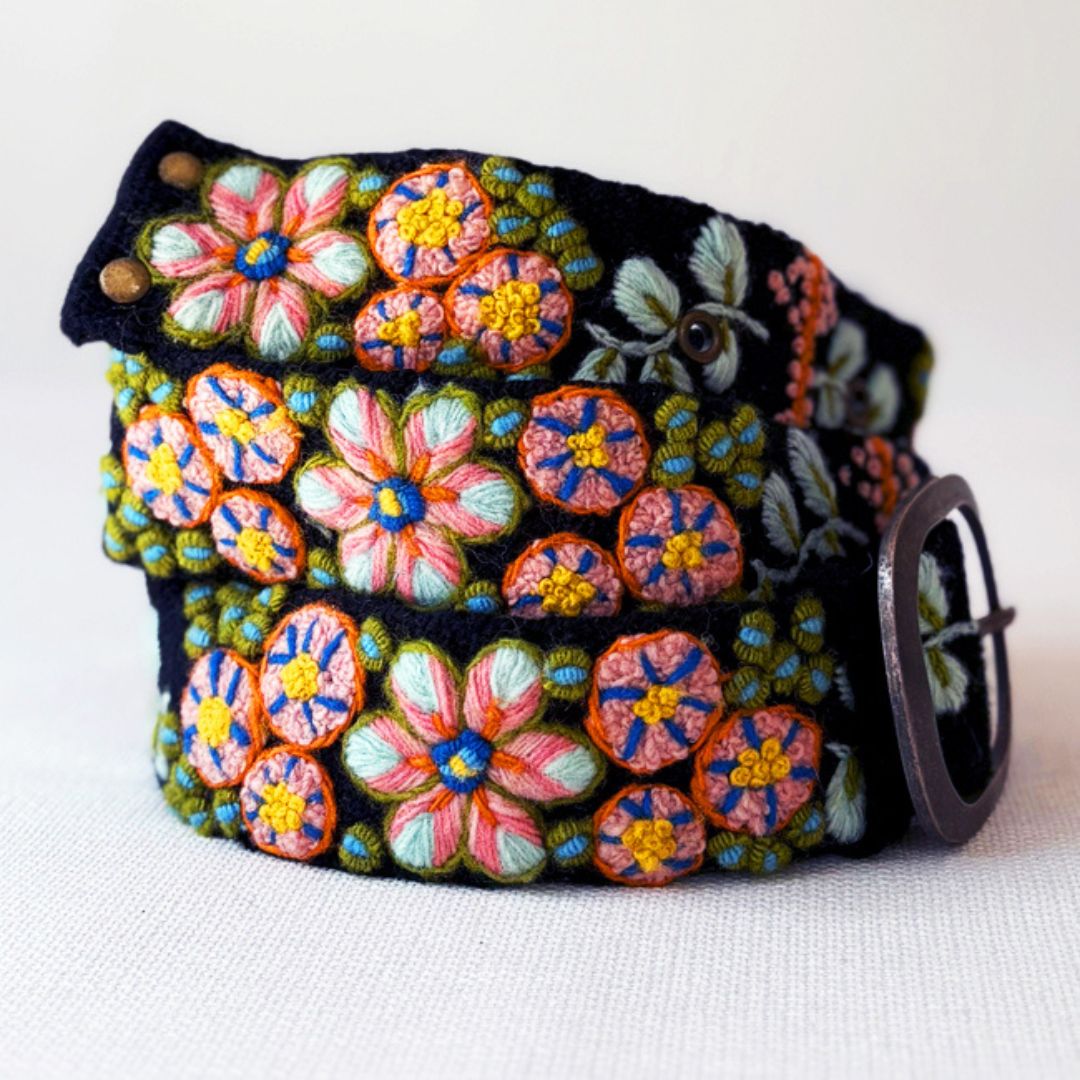 Colorful floral embroidery belt on a white background