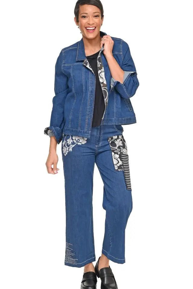 woman wearing denim jacket with patches