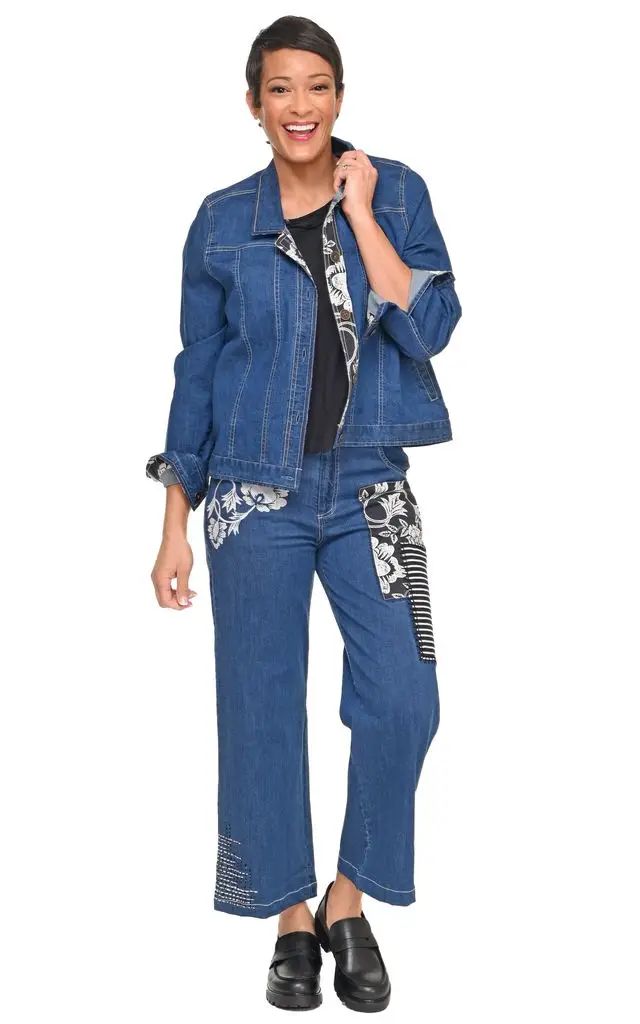 woman wearing denim jacket with patches