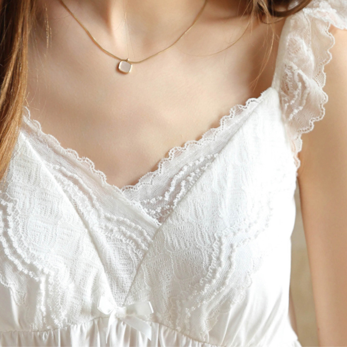 Close-up of the lace trim neckline with built-in bra support