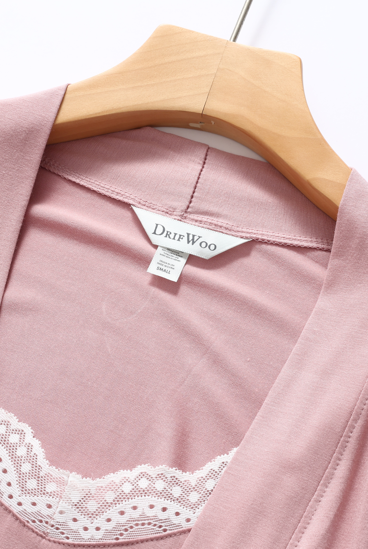 Close-up of the lace trim on the dusty rose robe and slip
