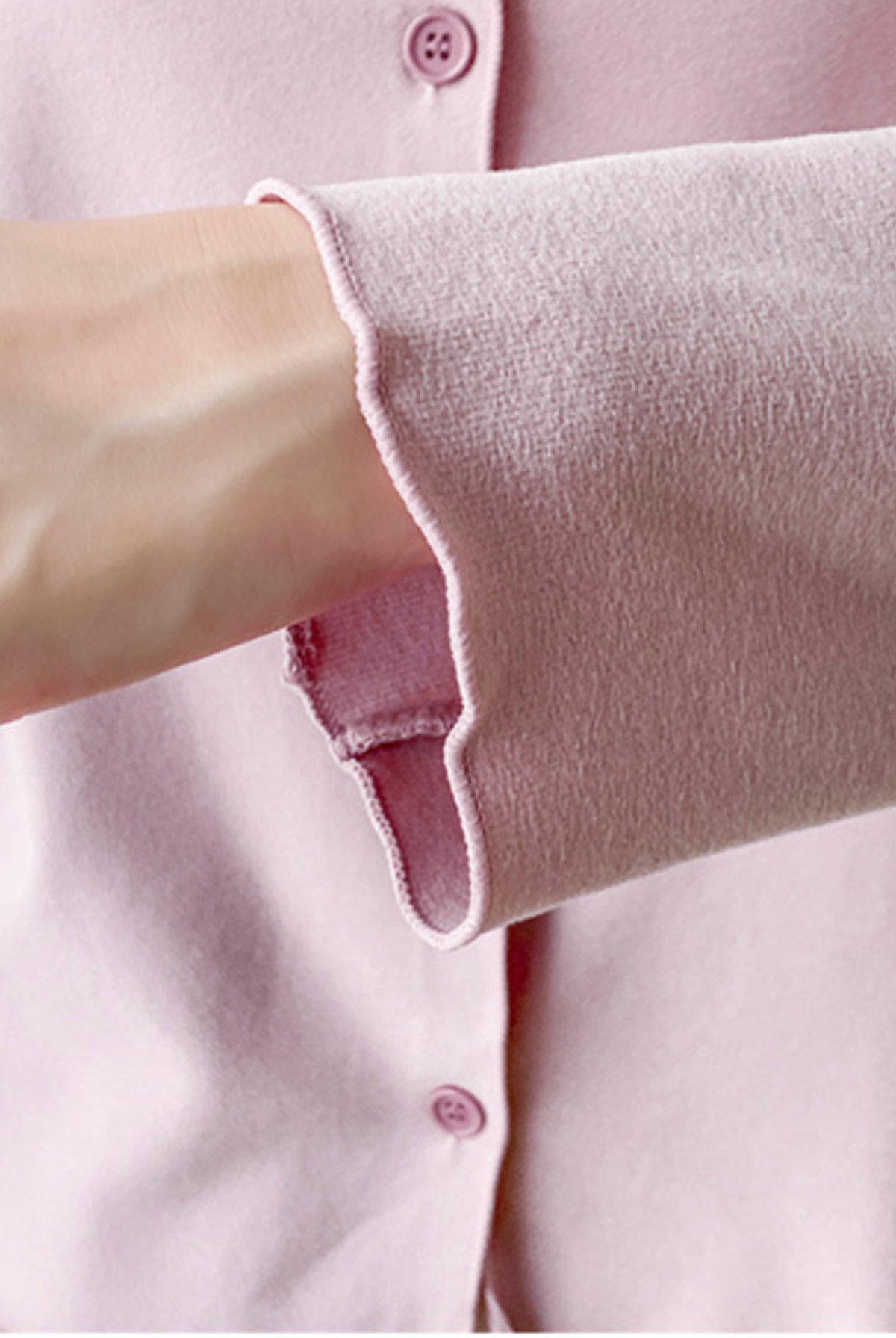 Lettuce-edge cuff detail on the dusty pink modal pajama top