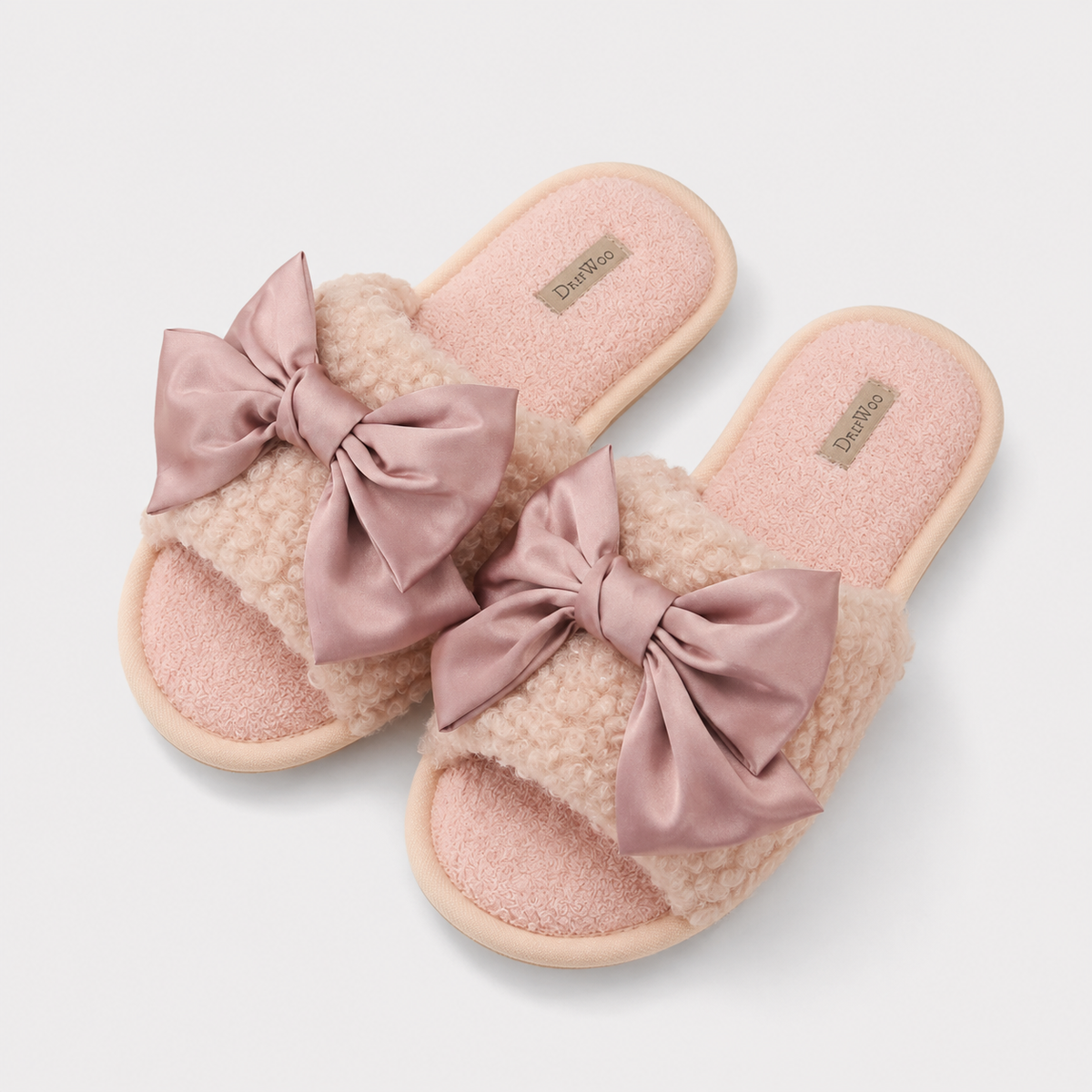 Rose pink plush slide slippers with oversized satin bows