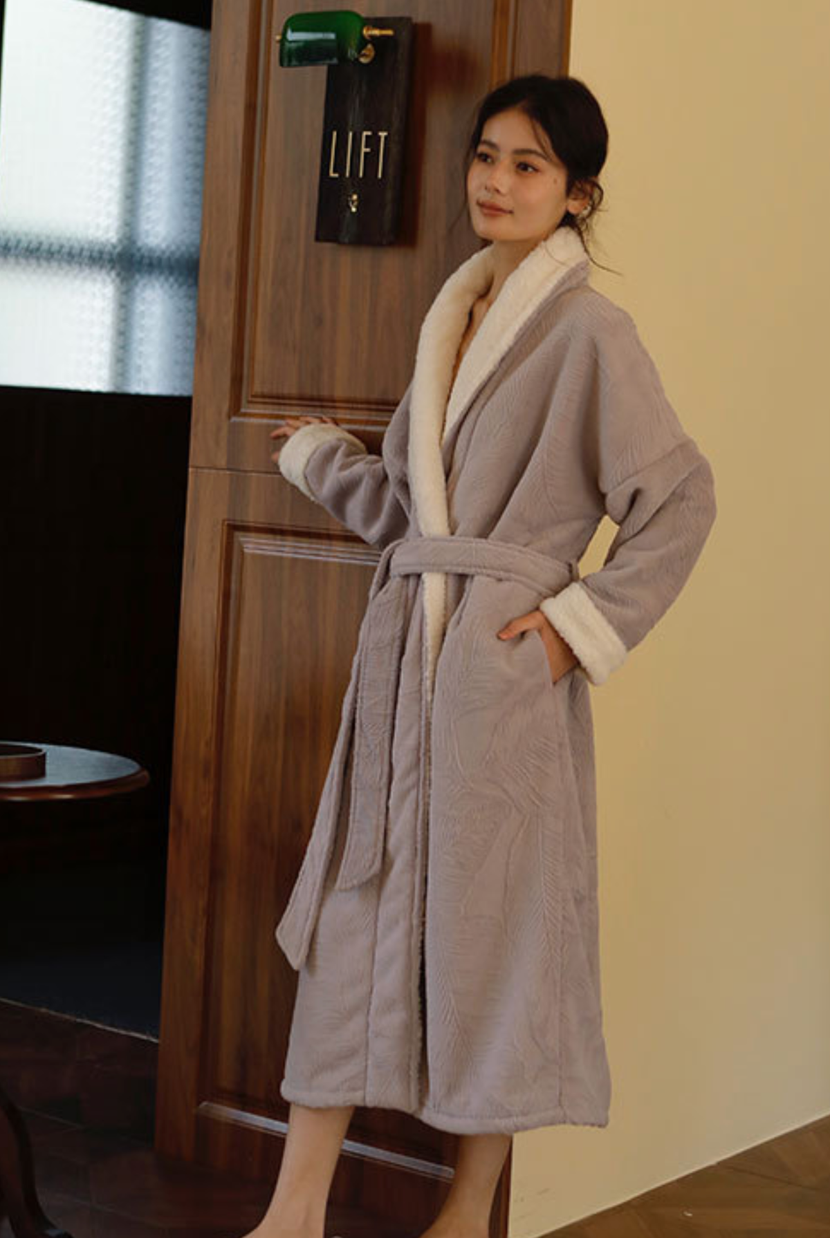 Woman wearing the lavender sherpa lined robe, full length