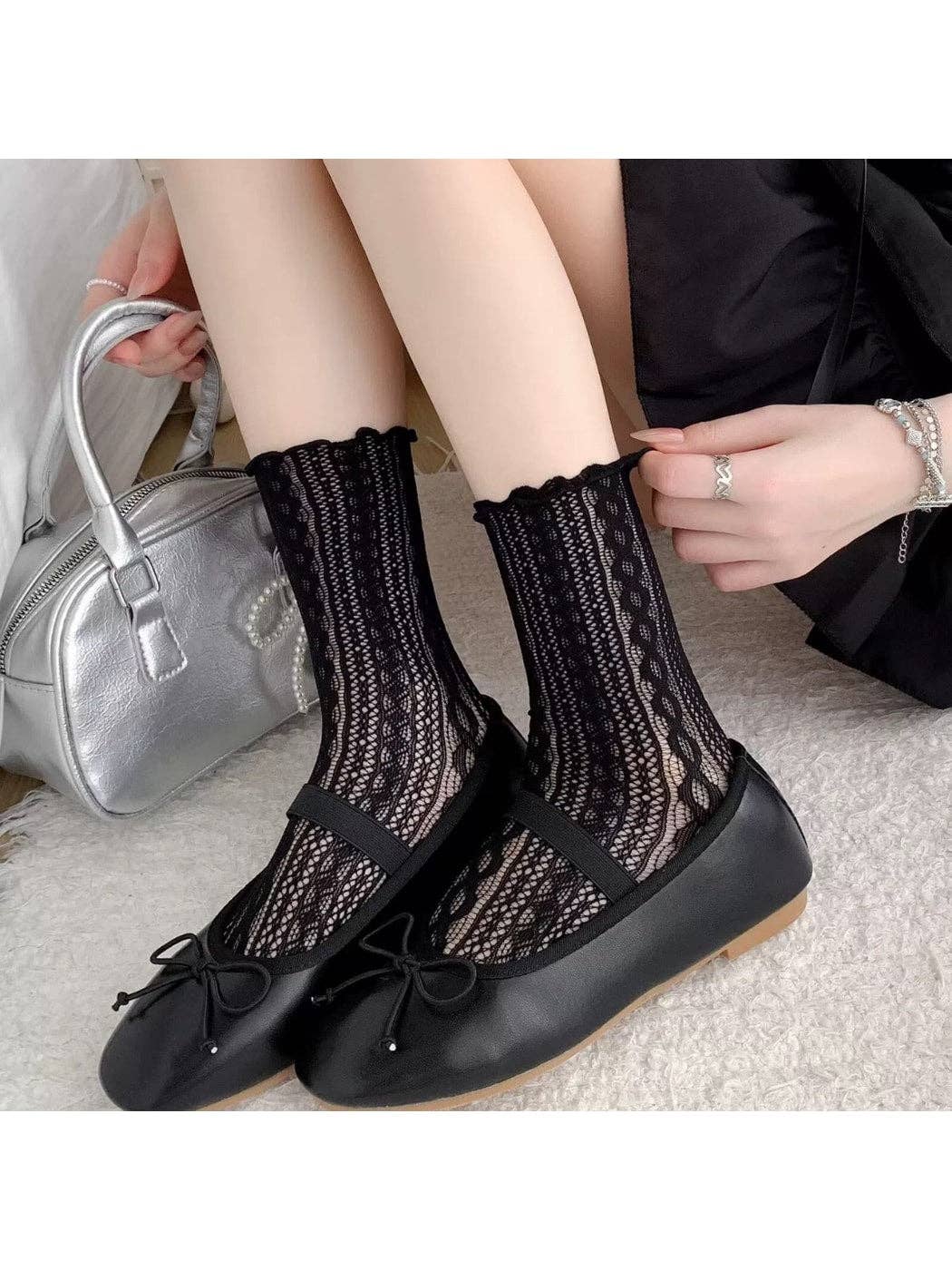 Black openwork lace ruffle crew socks with black flats