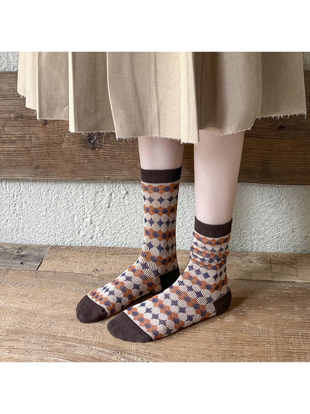 Plaid winter crew socks worn with a skirt
