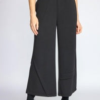 Habitat Featherlux Knit Crossroads Pant in black, a wide-leg cropped knit pant, styled with black ankle boots