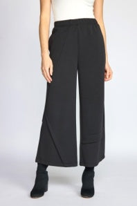 Habitat Featherlux Knit Crossroads Pant in black, a wide-leg cropped knit pant, styled with black ankle boots