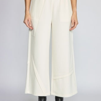 Habitat Featherlux Knit Crossroads Pant in ivory, a wide-leg cropped knit pant, styled with black ankle boots