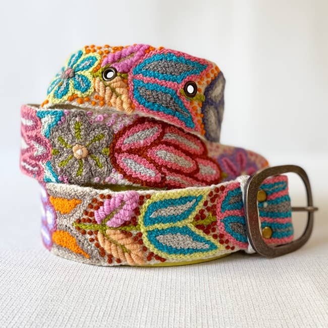 Jenny Krauss Folklorica Floral Embroidered Wool Belt in cream, coiled to show the hand embroidery