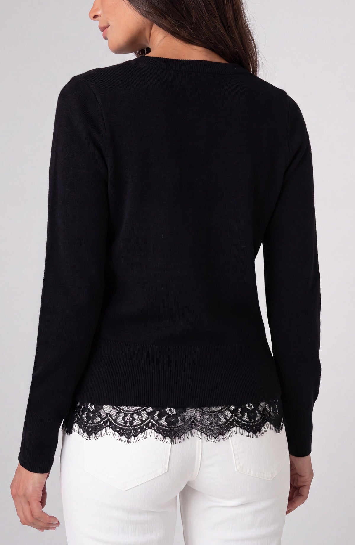 Back view of the black Liverpool lace trim V-neck sweater