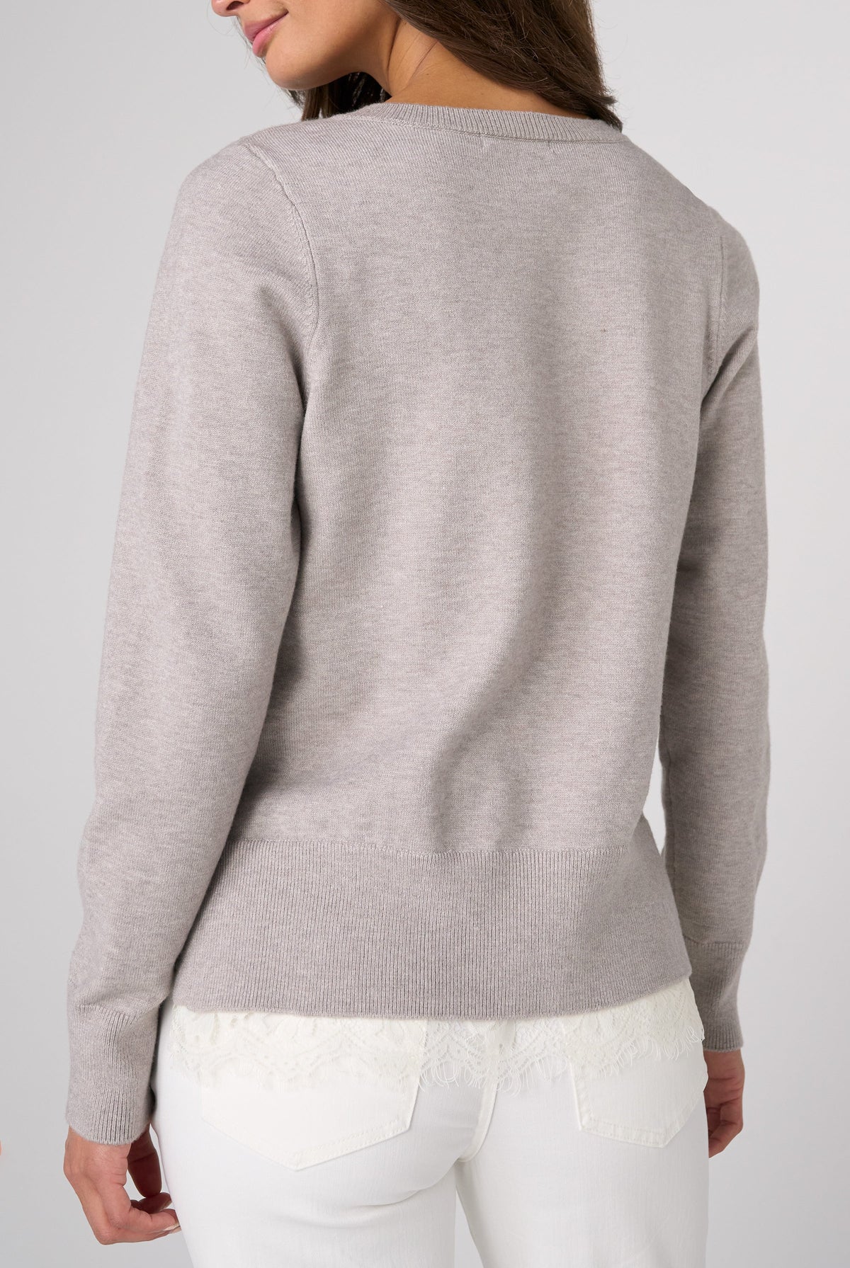 Back view of the soft grey heather Liverpool lace trim V-neck sweater
