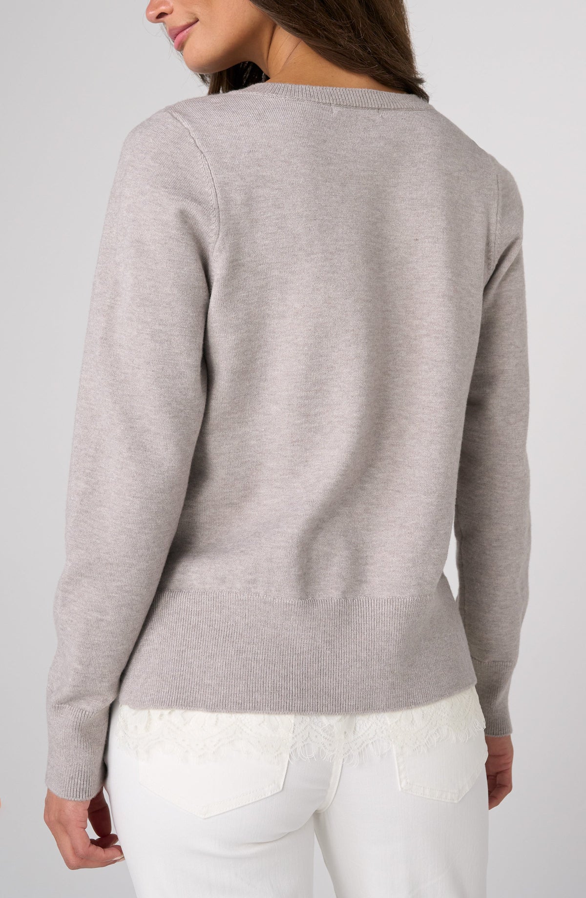Back view of the soft grey heather Liverpool lace trim V-neck sweater