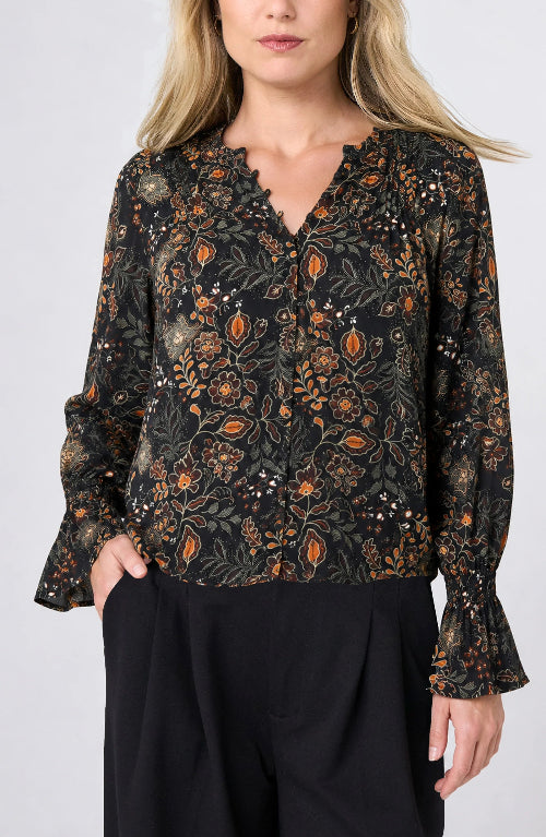 Front view of the Long Sleeve Woven Blouse with Pintucks in Black Rust floral, V-neck button front with smocked cuffs