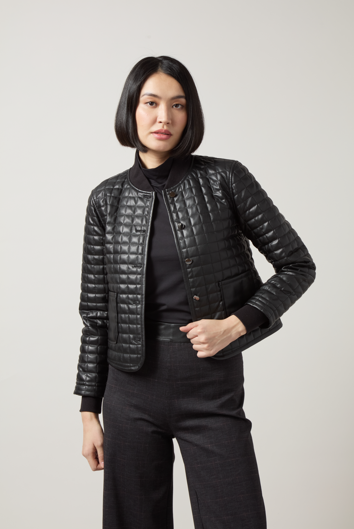 Lysse Agnes Quilted Vegan Leather Jacket in Black, styled full length with wide-leg pants