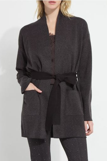 Model wearing the Lysse Laila Double Faced Belted Cardigan in black and grey melange with a black tie belt and patch pockets
