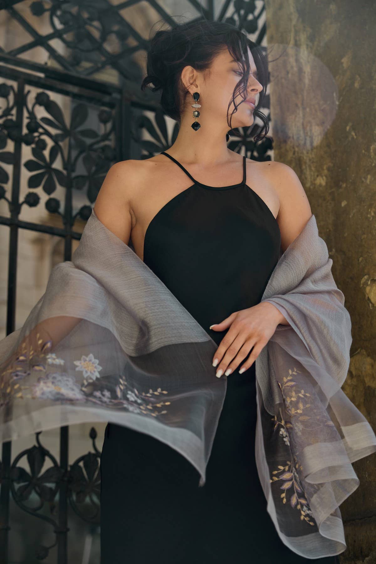 Woman wearing the grey embroidered sheer scarf