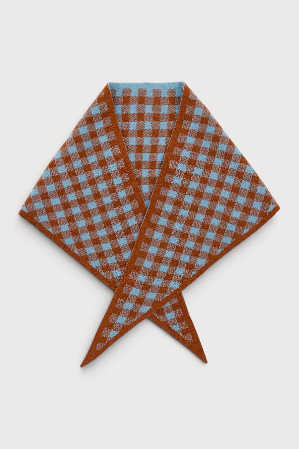 Sea blue gingham knit triangle wrap laid flat
