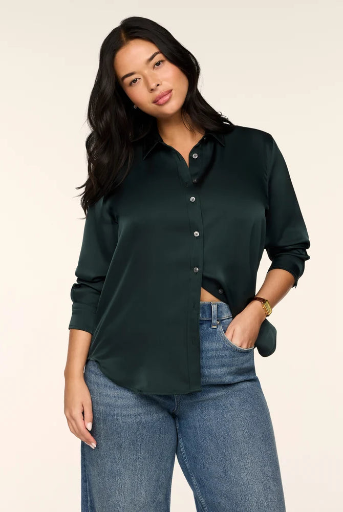 SPANX Silky Smooth Button Down in Night Forest deep green, half-tucked into jeans, front view