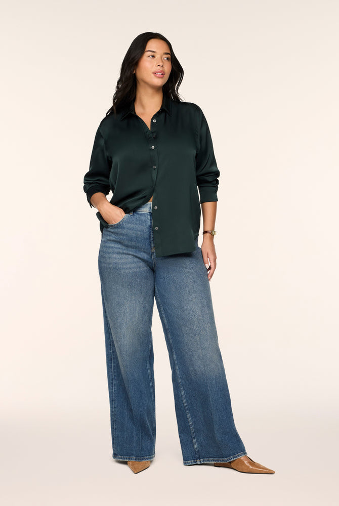SPANX Silky Smooth Button Down in Night Forest deep green with wide leg jeans and nude heels, full-length view