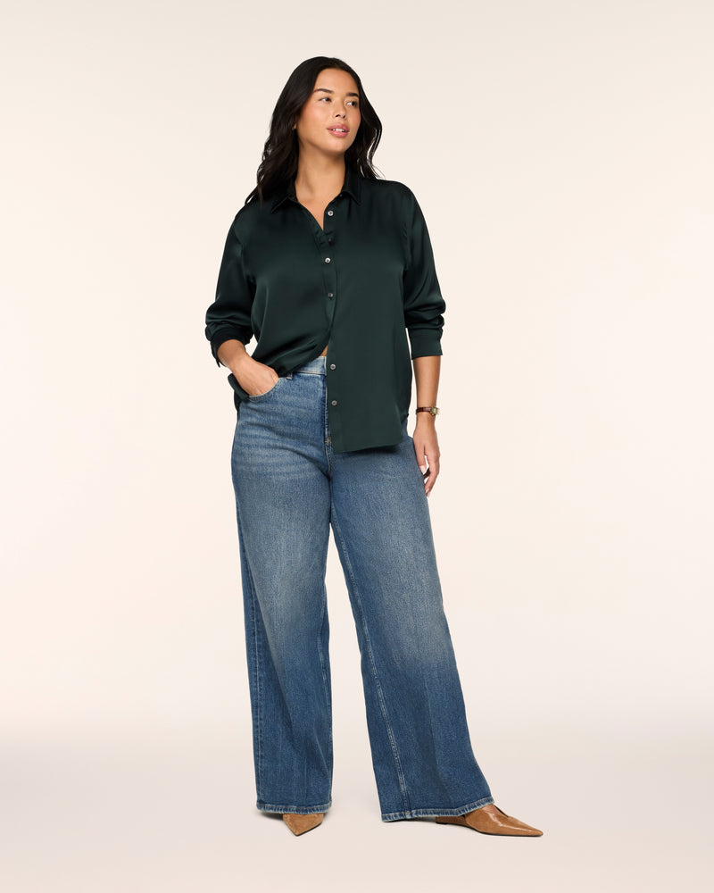 SPANX Silky Smooth Button Down in Night Forest deep green with wide leg jeans and nude heels, full-length view