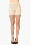 SPANXshape Mid-Thigh Sheers in Bisque, front view on model showing the sheer leg and mid-thigh shaper