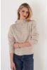 Trisha Tyler Heathered Mock Neck Sweater in natural oatmeal, relaxed long-sleeve pullover worn with dark jeans, front view