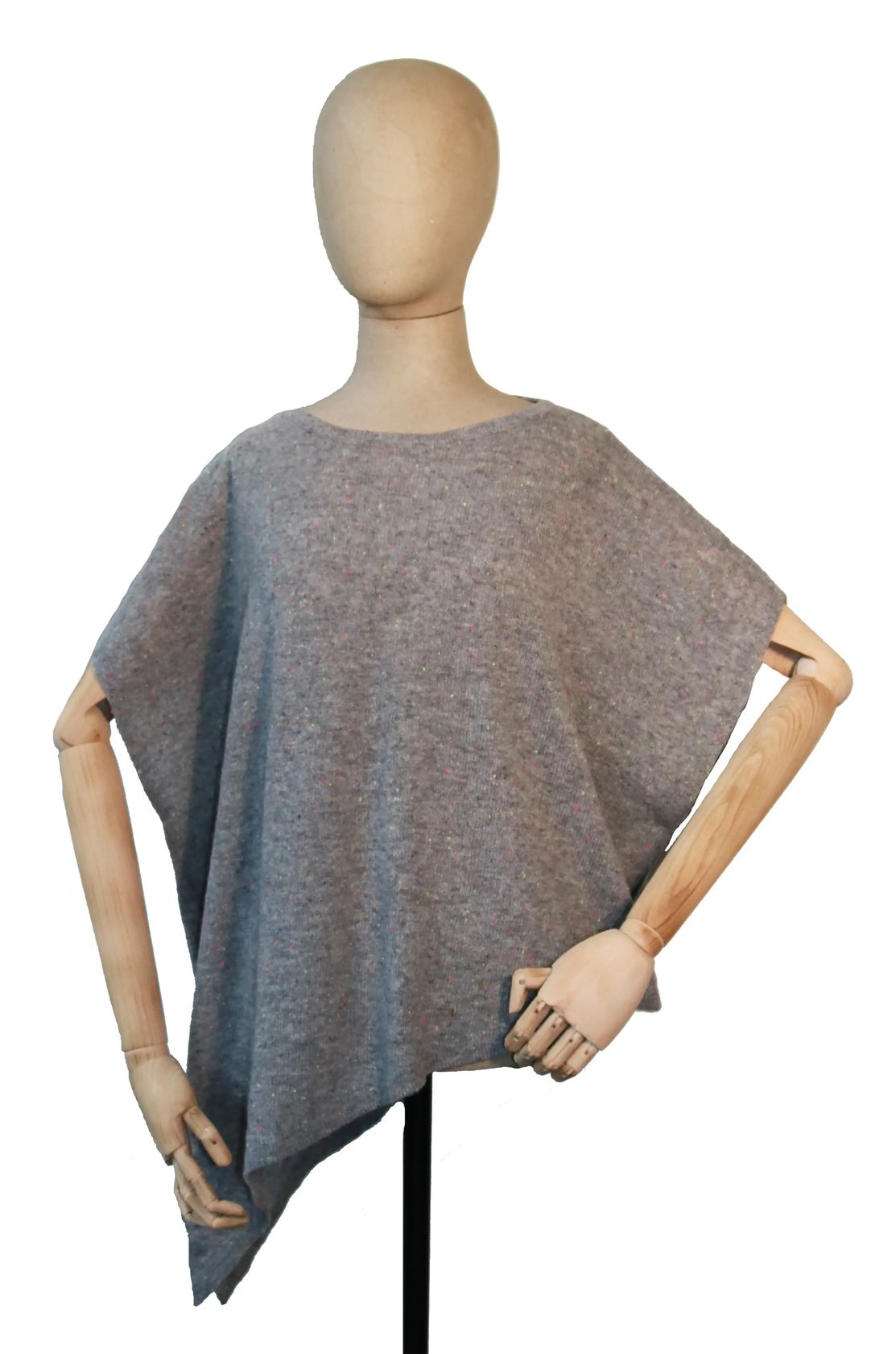 A heather gray knit poncho sweater displayed on a wooden mannequin torso against a plain white background.