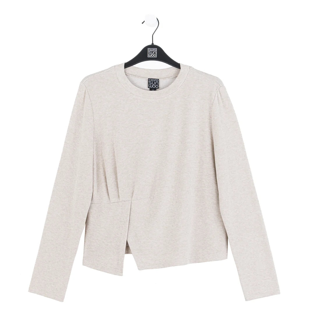 Light gray blazer on a hanger with a white background