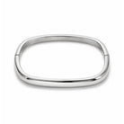 A polished silver-toned metal bangle bracelet with a rounded rectangular or egg-shaped profile, shown on a clean white background.