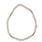 Ali & Bird shell pearl bracelet with gold-toned bead accents on a white background