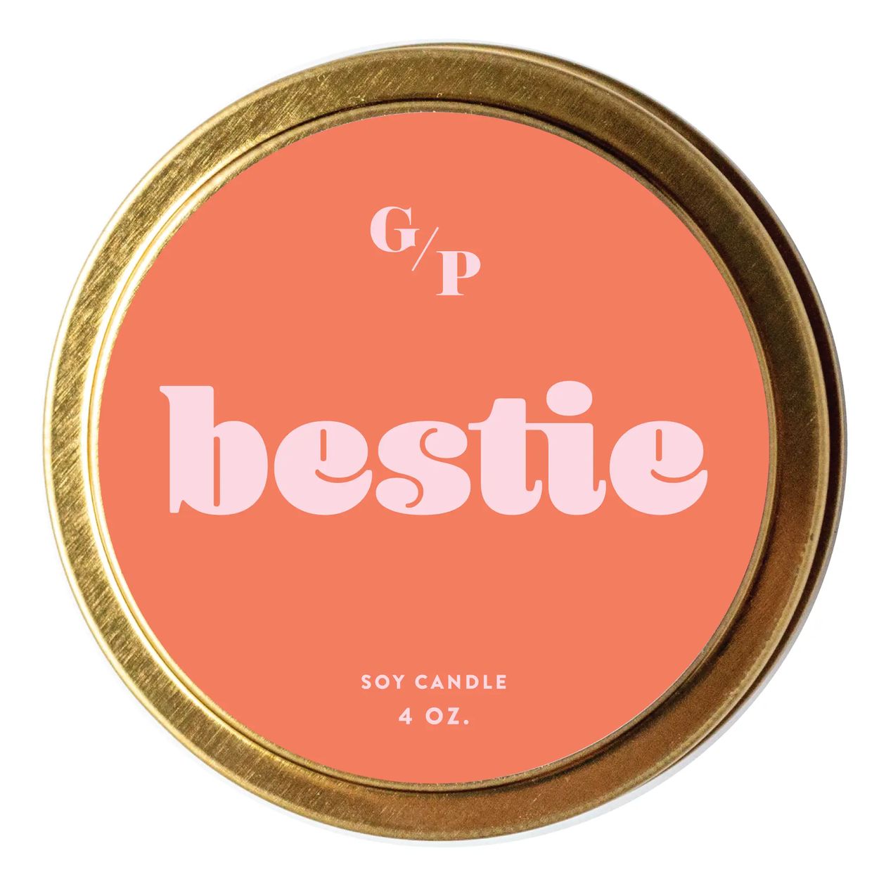 A round gold metal tin candle lid with a coral pink label reading 'G/P bestie' and 'SOY CANDLE 4 OZ.' on a white background.