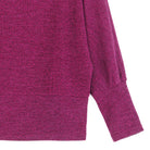 Close-up of the heathered knit texture on the Clara Sunwoo magenta sweater