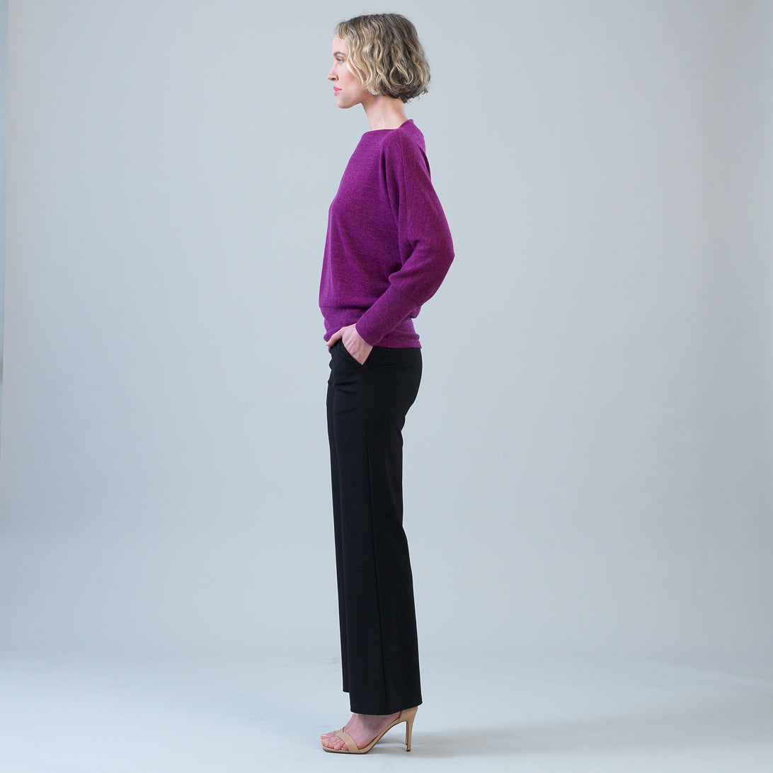 Side view of the Clara Sunwoo magenta blouson sweater showing the dolman sleeve