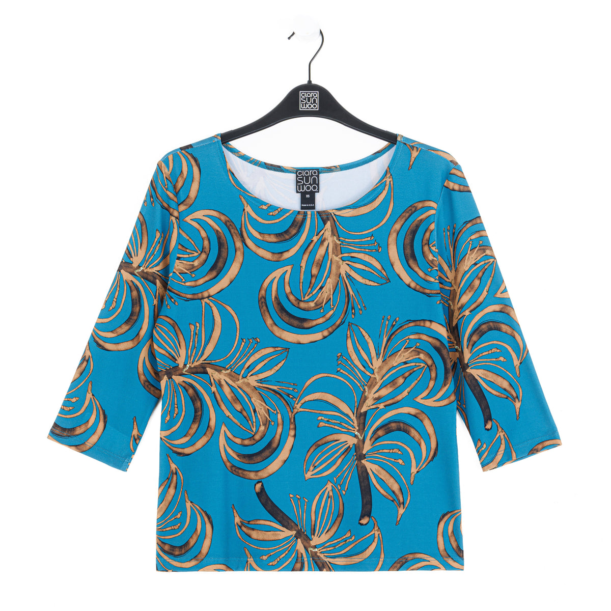 Clara Sunwoo turquoise and brown leaf print top laid flat