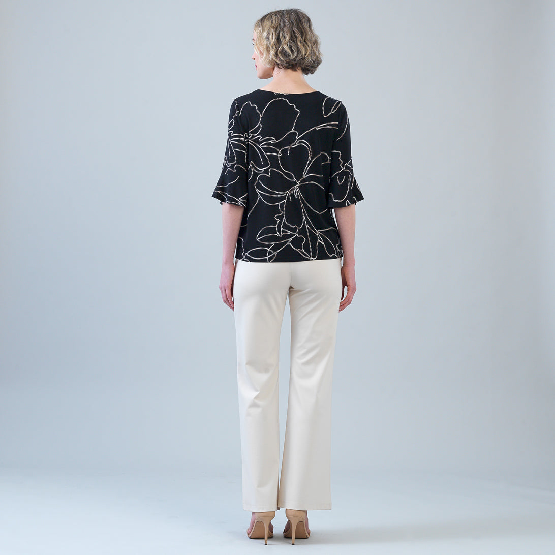 Back view of the Clara Sunwoo floral foiled knit top