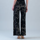 Back view of the Clara Sunwoo floral foiled palazzo pant