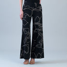 Clara Sunwoo floral foiled palazzo pant in black and taupe, front view