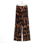 Clara Sunwoo black and brown geo chain print pant laid flat