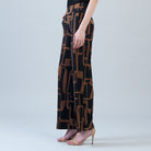 Side view of the Clara Sunwoo geo chain print wide leg pant