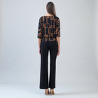 Back view of the Clara Sunwoo geo print soft knit top