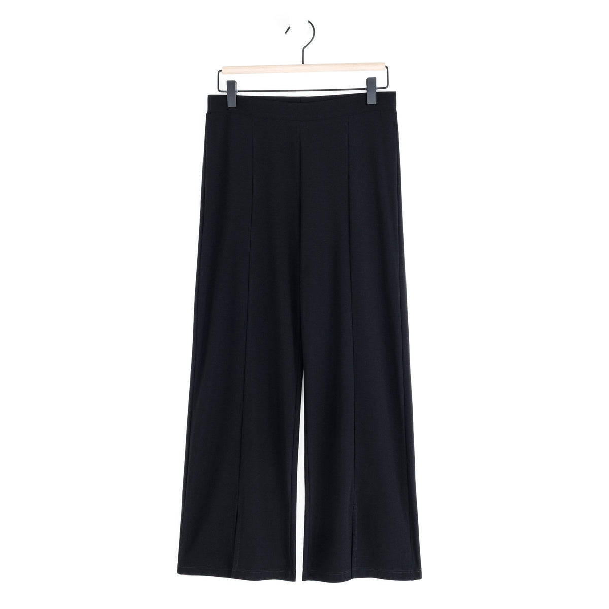 Clara Sunwoo black kick front slit ankle pant laid flat