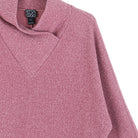 Close-up of the crossover petal neckline in mauve ribbed knit